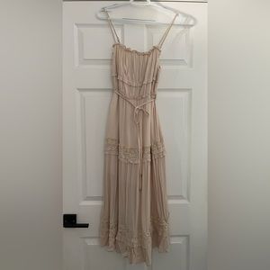 Size small women’s dress, cream color, new with tags